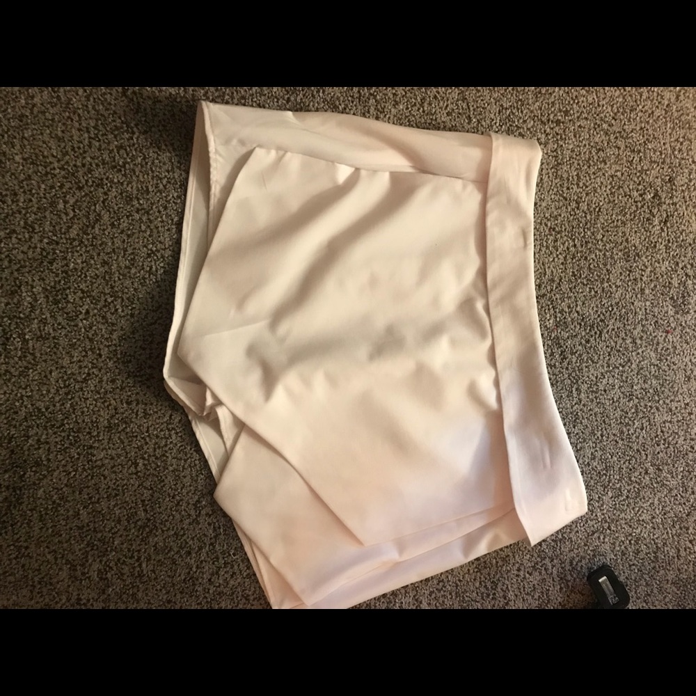 2 skorts, Black pair and white pair